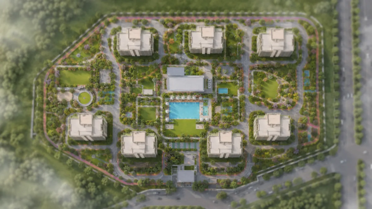 Signature Regal master plan site layout showing the tower placement, the central clubhouse and pool, the landscaped gardens and the internal roads across the 8.5-acre site
